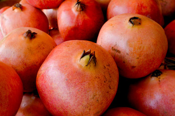 Pomegranate on display in a market