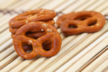 Pretzels on bamboo surface, closeup
