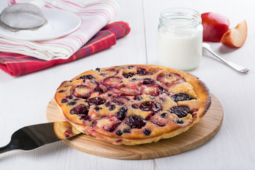 Clafoutis with plum and blackberry