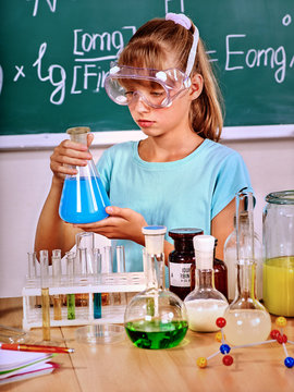 Child in chemistry class.