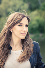 Fototapeta premium Pretty girl with smoky eyes make up outdoor portrait.