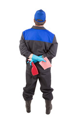 Worker back with spray and sponge.