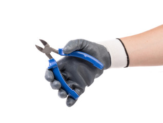 Hand in gloves holding blue pliers.