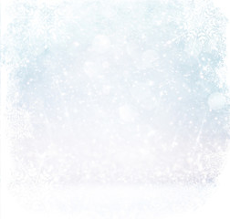 white and silver abstract bokeh lights. defocused background with snowflake overlay
