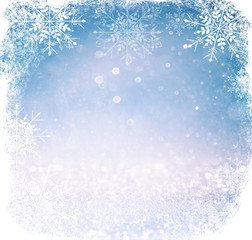 white and silver abstract bokeh lights. defocused background with snowflake overlay
