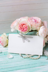Postcard with rose  flowers and empty tag for your text