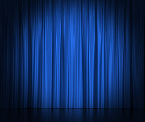 Blue silk curtains for theater and cinema spotlit light in the