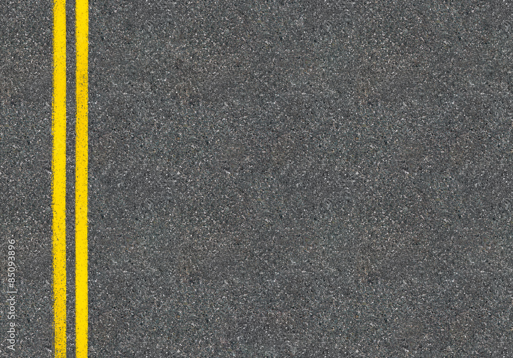 Wall mural asphalt road top view with two yellow lines