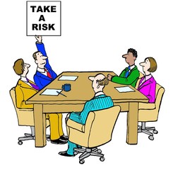 Cartoon of business meeting where a businessman is holding a sign that says 'take a risk'.