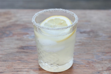 Glass of freshly prepared, cold and refreshing lemonade.