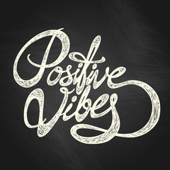 Positive Vibes- hand drawn quote, white on the blackboard background