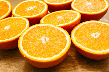 Oranges cut set on wood