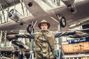 Casual man and playne parking.