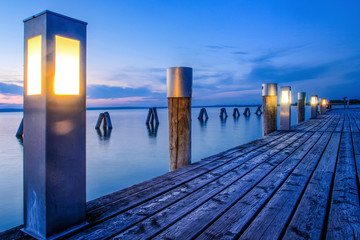 lighted wooden pier