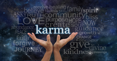 Cosmic Karma - Female hands cupped upwards with the word 'Karma' floating away surrounded by a relevant word cloud on a deep space night sky dark blue  background  - obrazy, fototapety, plakaty