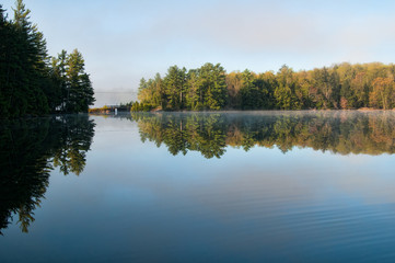 Fototapeta na wymiar Calm summer morning at a lake 