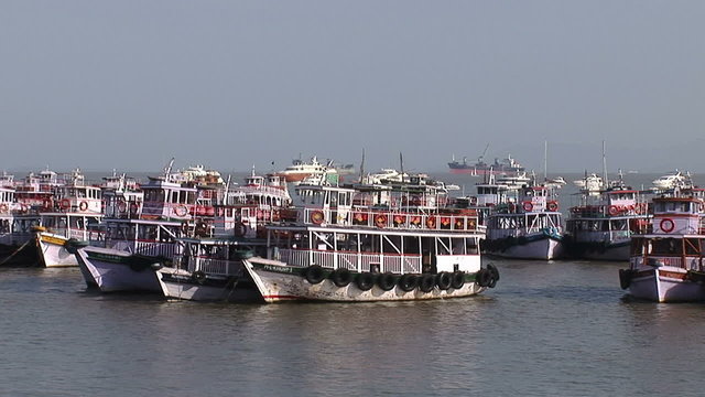 Colourful wooden ferries sailing from Mumbai 