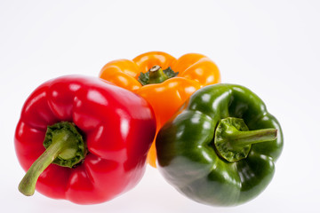 colorful peppers isolated on white background