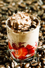 Coffee and chocolate dessert with ice cream and strawberries, se