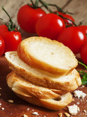 Toasted white bread and tomato, selective focus