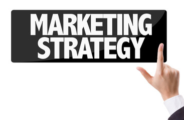 Businessman pressing button with the text: Marketing Strategy