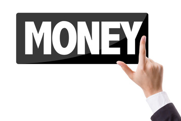 Businessman pressing button with the text: Money
