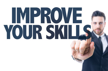 Business man pointing the text: Improve Your Skills