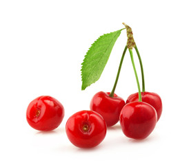 Ripe cherries with a leaf.