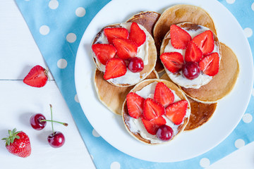 Delicious pancakes morning sweet dessert food with fruits and