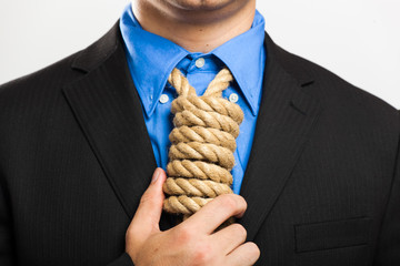 Businessman showing a loop knot instead of his necktie