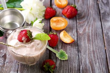 Chocolate ice cream with coffee bean and strawberry