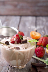 Chocolate ice cream with coffee bean and strawberry
