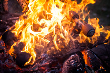 Burning old skateboard. The end of childhood.