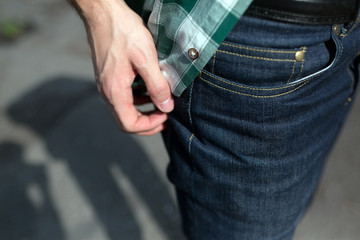 Confident man posing in selvedge  jeans