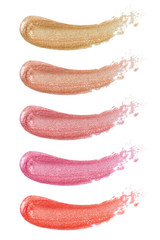 Lip glosses / Different lip glosses isolated on white