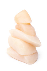 Stack of peeled raw scallops