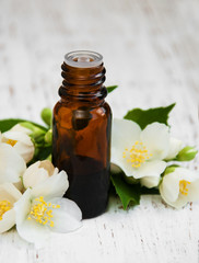 Obraz na płótnie Canvas essential oil with jasmine flower