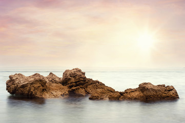Fototapeta na wymiar Rock in the sea.