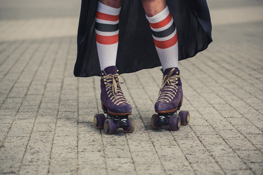 female legs in roller skating