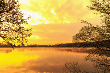 Serene Sunrise at the Lake in Bavaria, Germany. Lovely warm spring morning