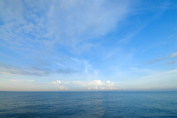 Horizon line between sky and sea water