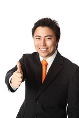 businessman in his 20s wearing a suit with an orange tie