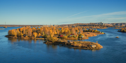 Autumn sunny island in the city of Irkutsk on the Angara River