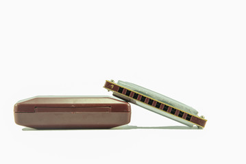 harmonica on white background