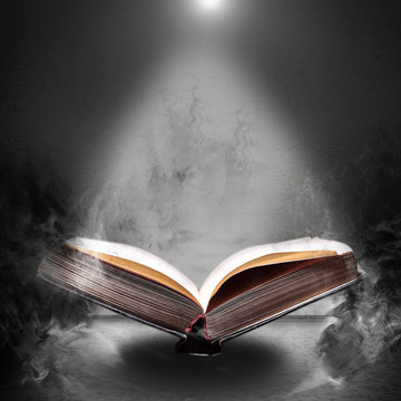 Magic book hovering in the misty haze