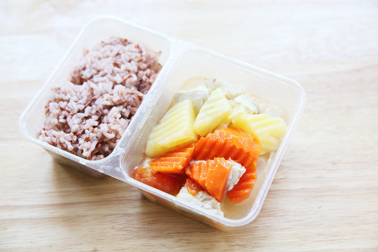 Clean food steam potato chicken carrot with rice in bento