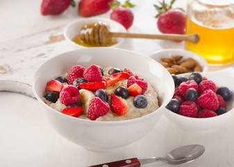 Homemade Oatmeal with fresh Berries for  Healthy Breakfast.