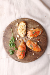Scrambled eggs with smoked salmon, on baguette toast