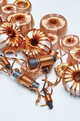 Electrical coils on metal background