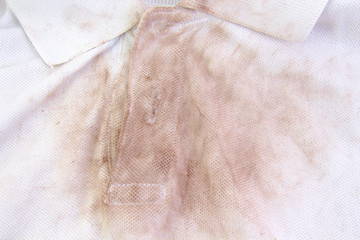 Close up of a very dirty white shirt